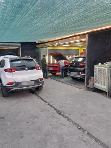 عکس تعمیرگاه ام جی لند