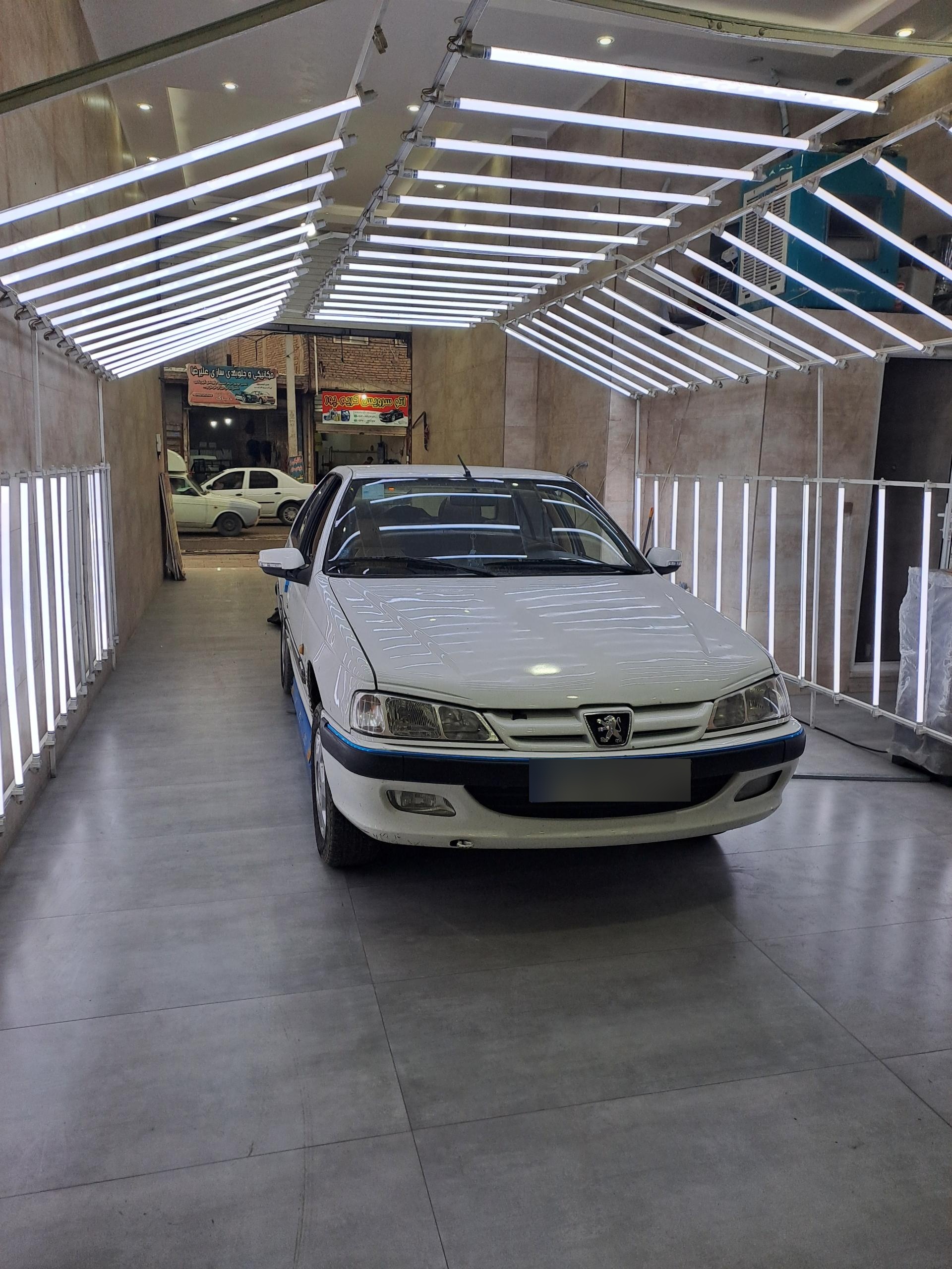 عکس مرکز کارشناسی و تشخیص رنگ بدنه خودرو عطاء