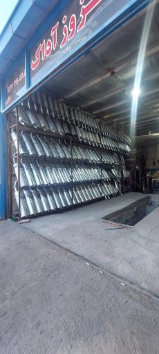 عکس جوشکاری اگزوز آداک