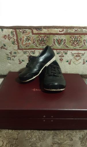 عکس کارگاه کفاشی جواد