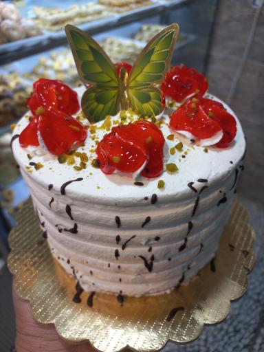 عکس شیرینی سرای دهکده