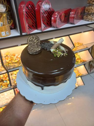 عکس شیرینی سرای دهکده