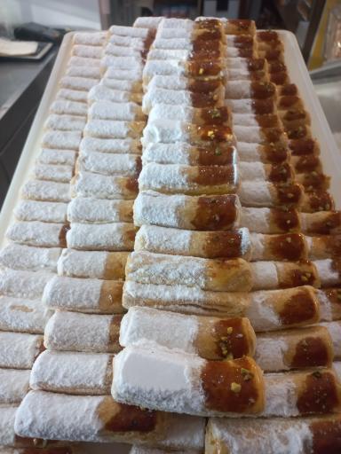 عکس شیرینی سرای دهکده