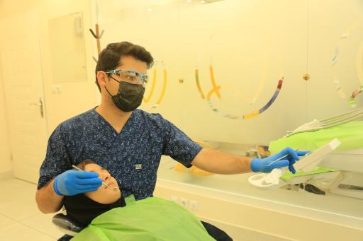 عکس دندانپزشکی دکتر بهزاد فتحی افکاری