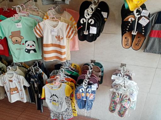 عکس فروشگاه پوشاک کوچولو