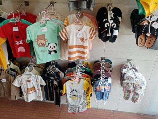 عکس فروشگاه پوشاک کوچولو