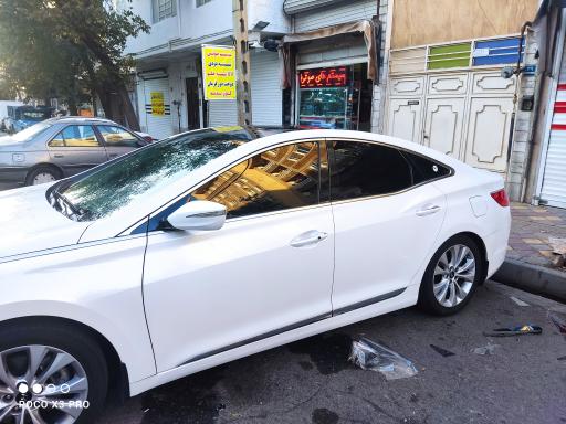 عکس سیستم و شیشه دودی کارن