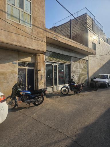 عکس تعمیرات موتورسیکلت علی