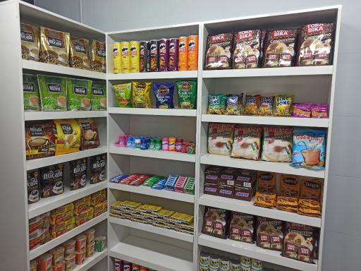 عکس فروشگاه تینوش