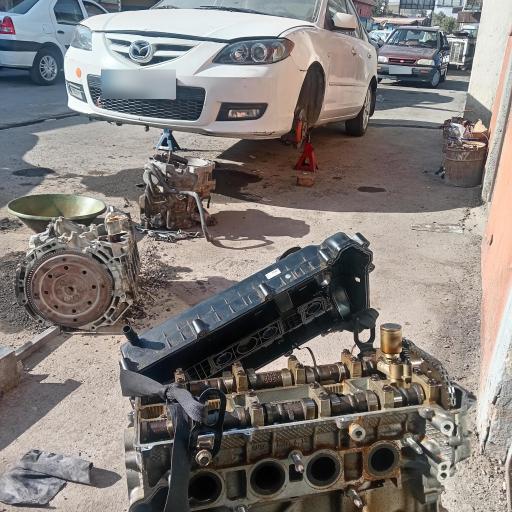 عکس تعمیرگاه مجاز مزدا 