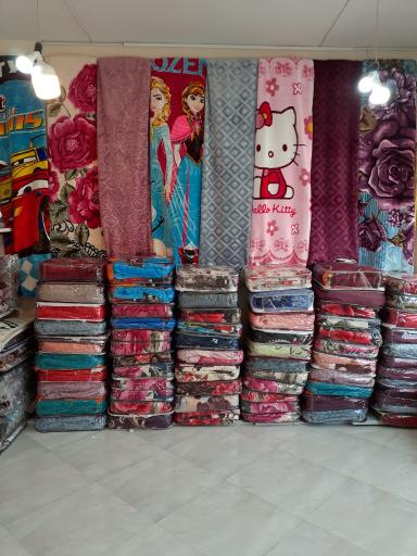 عکس فروشگاه پارچه الهی