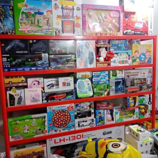 عکس فروشگاه و تعمیرات اسباب بازی زرافه