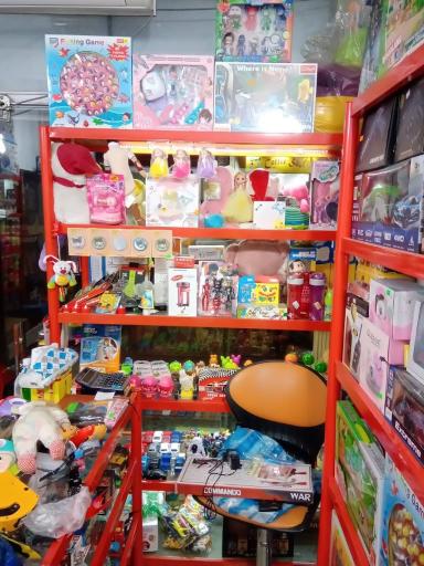 عکس فروشگاه و تعمیرات اسباب بازی زرافه