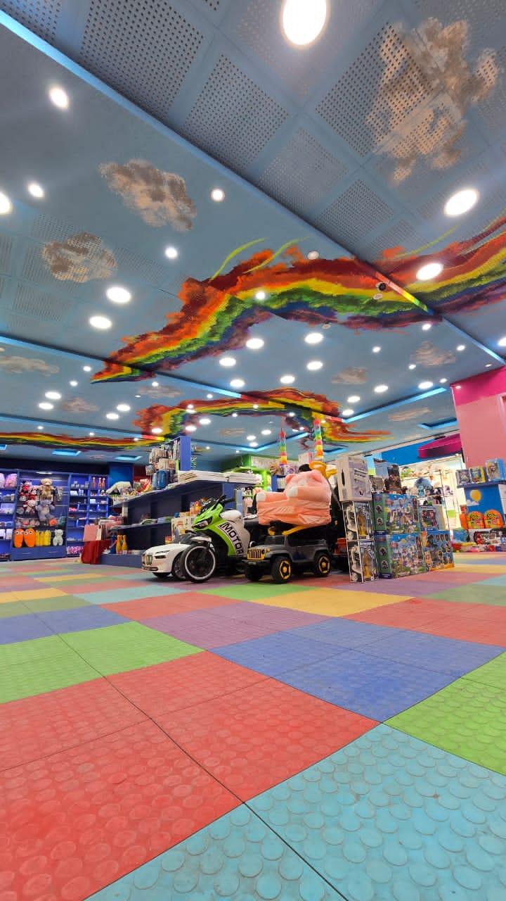 عکس فروشگاه اسباب بازی رنگین کمان