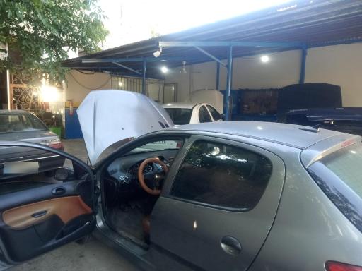 عکس تعمیرگاه خودرو تخت گاز