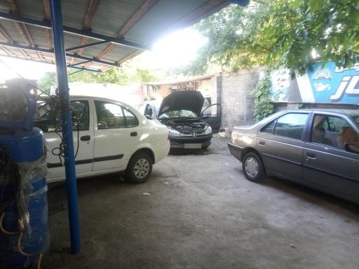 عکس تعمیرگاه خودرو تخت گاز