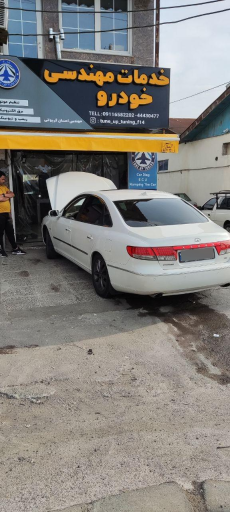 عکس تعمیرگاه و فروشگاه خدمات مهندسی خودروF14