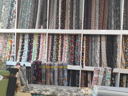 عکس پارچه سرای بزرگ بنتون