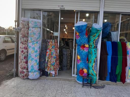 عکس پارچه سرای بزرگ بنتون