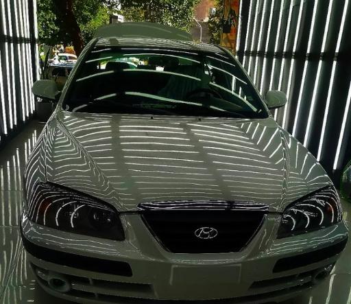 عکس کارشناسی و تشخیص رنگ خودرو علی موتمنی