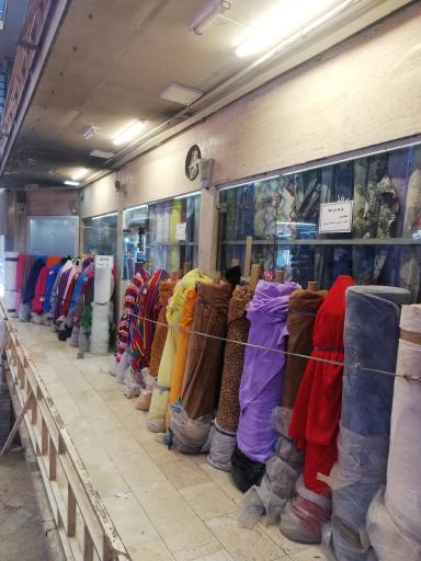 عکس فروشگاه پارچه فروشی مطلق