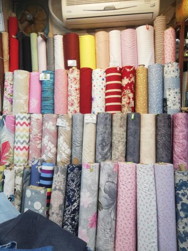 عکس فروشگاه پارچه فروشی مطلق
