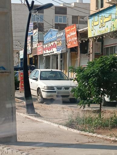 عکس تنظیم موتور حسین فرجادیان