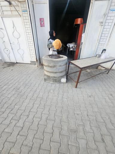 عکس نانوایی سنتی حسینعلی
