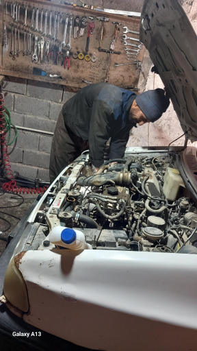 عکس تعمیرگاه خودرو درندی