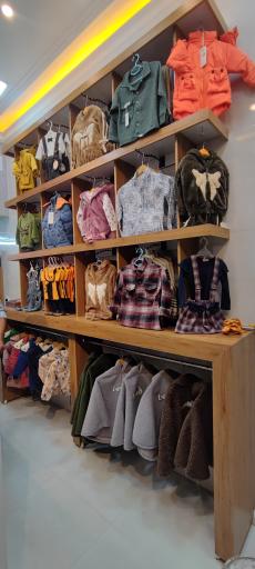 عکس فروشگاه لباس کید استایل