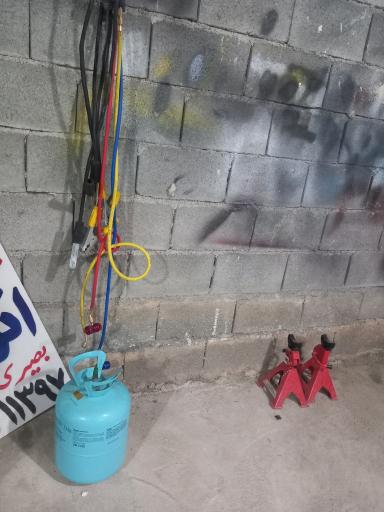 عکس باطری سازی برقکاری و تنظیم موتور بصیری