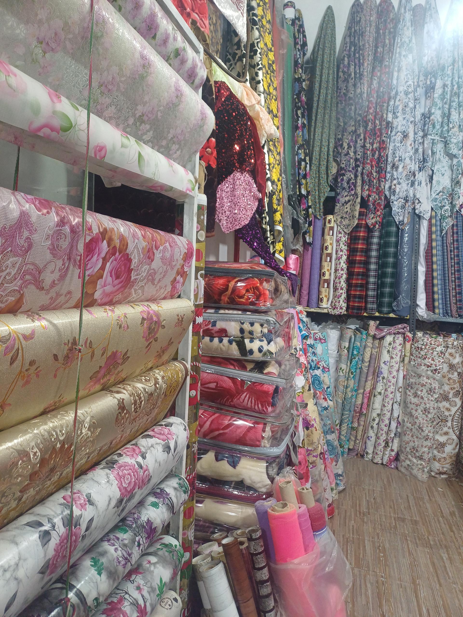 عکس پارچه فروشی حاتمی