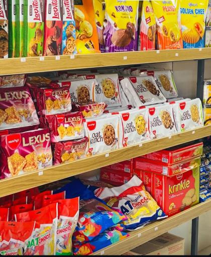 عکس فروشگاه مواد غذایی  خارجی میلکا