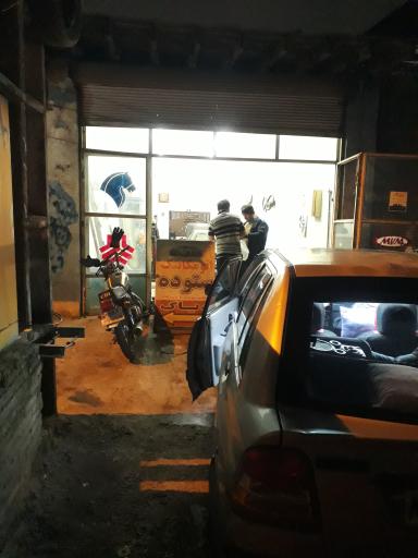 عکس مکانیکی حسن ستوده