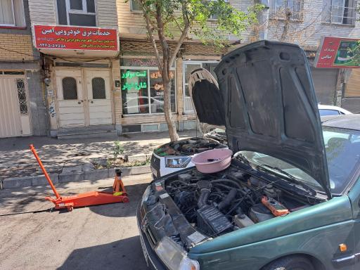 عکس خدمات برق خودرویی امین باتریسازی