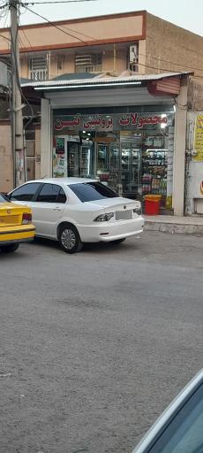 عکس فروشگاه مواد پروتئینی تین