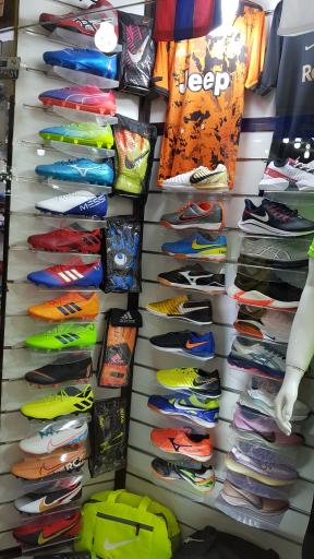 عکس فروشگاه ورزشی 90