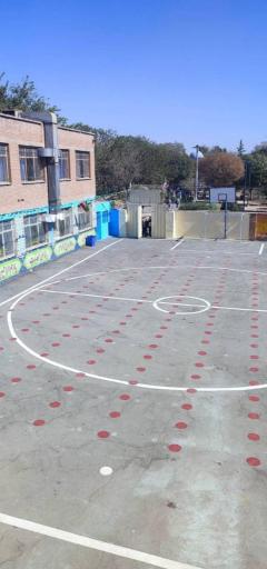 عکس درب ورودی اصلی مدرسه شهید آوینی