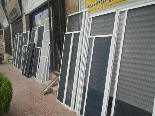 درب و پنجره دوجداره upvc و توری پلیسه غلام نژاد
