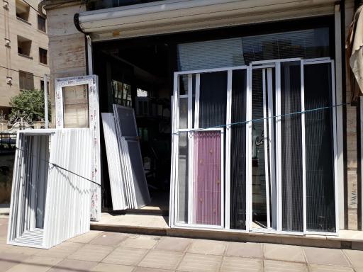 درب و پنجره دوجداره upvc و توری پلیسه غلام نژاد