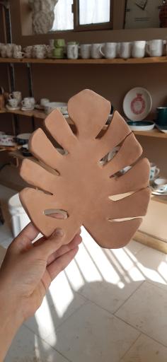 عکس خانه ی سفال و سرامیک خاک رنگ