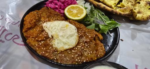 عکس رستوران باغچه طلائی