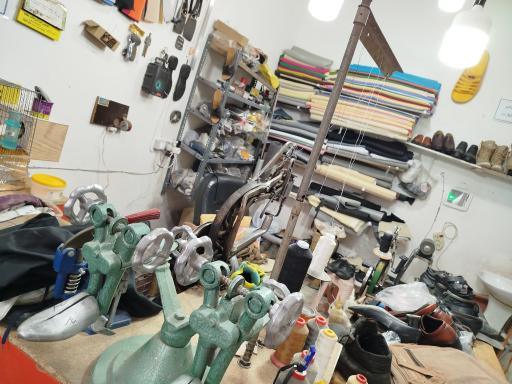 تعمیرات کیف و کفش حامد