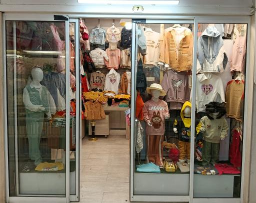 عکس فروشگاه لباس سایز باما