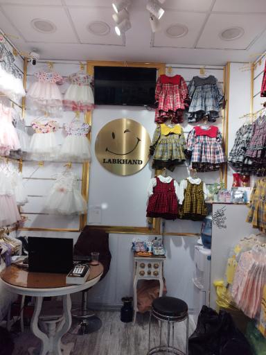 عکس تولید و پخش پوشاک لبخند 