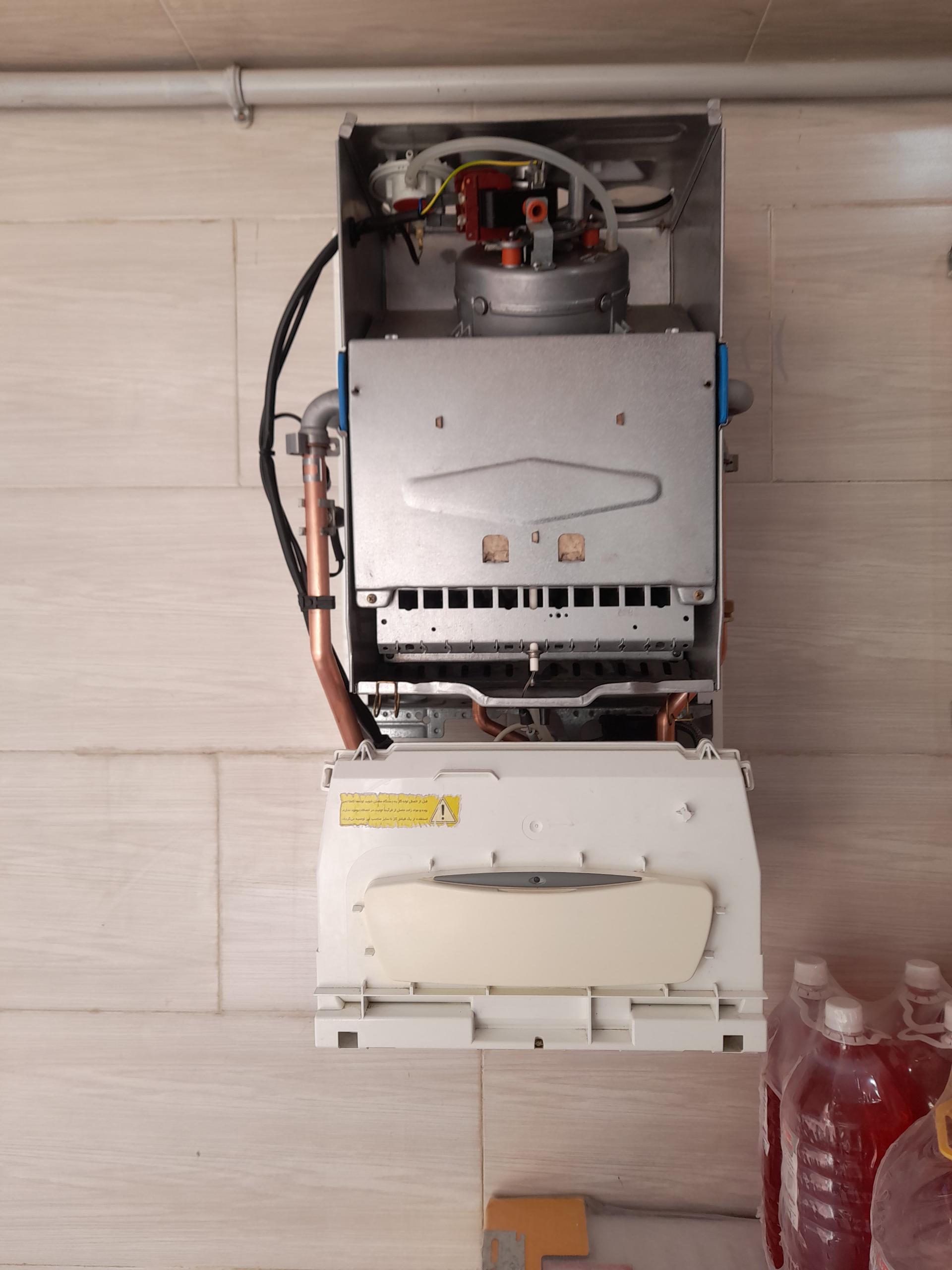 عکس تعمیرات و فروشگاه پکیج شوفاژ