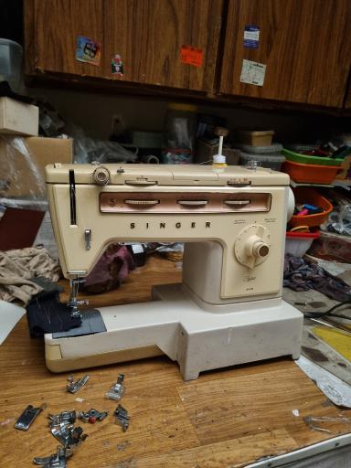 عکس تعمیرات چرخ خیاطی امانی