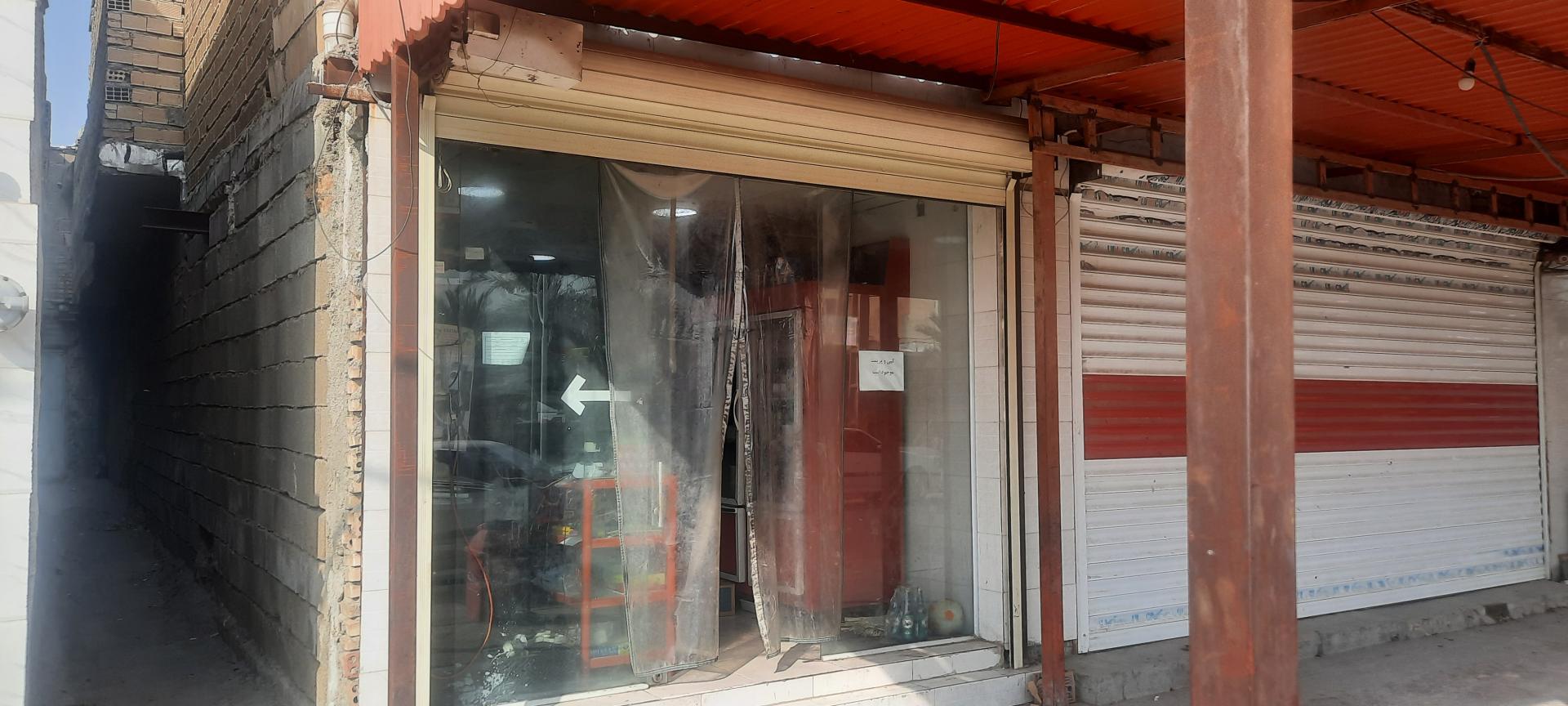 عکس سوپر مارکت مگطوفی