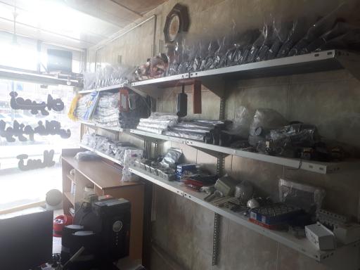 عکس فروشگاه و تعمیرات لوازم خانگی تسلا