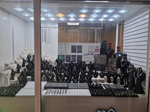 عکس نقره و ساعت فروشی کارتیر پرند